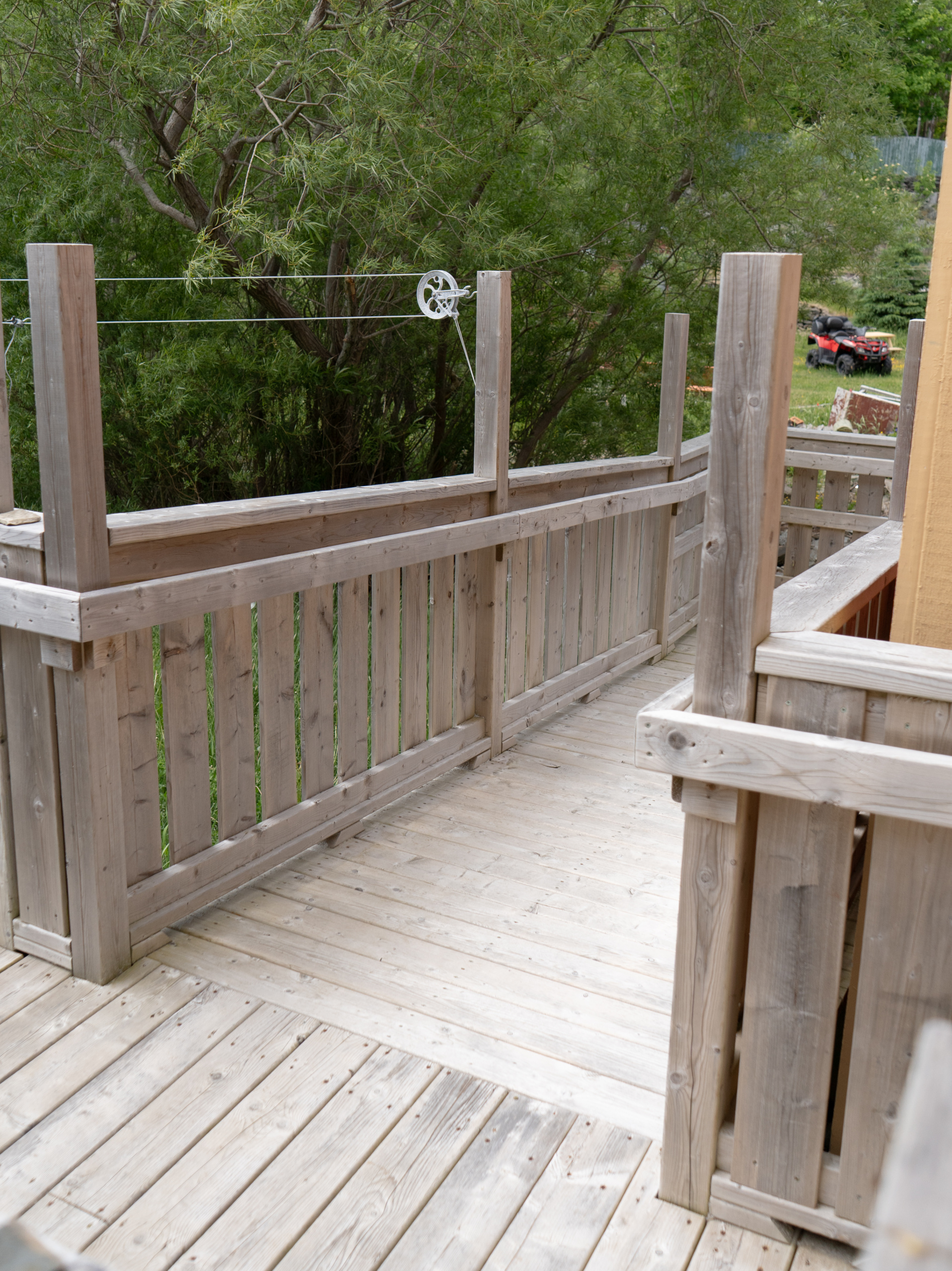 The wheelchair ramp as seen from the patio, looking backwards towards the ramp